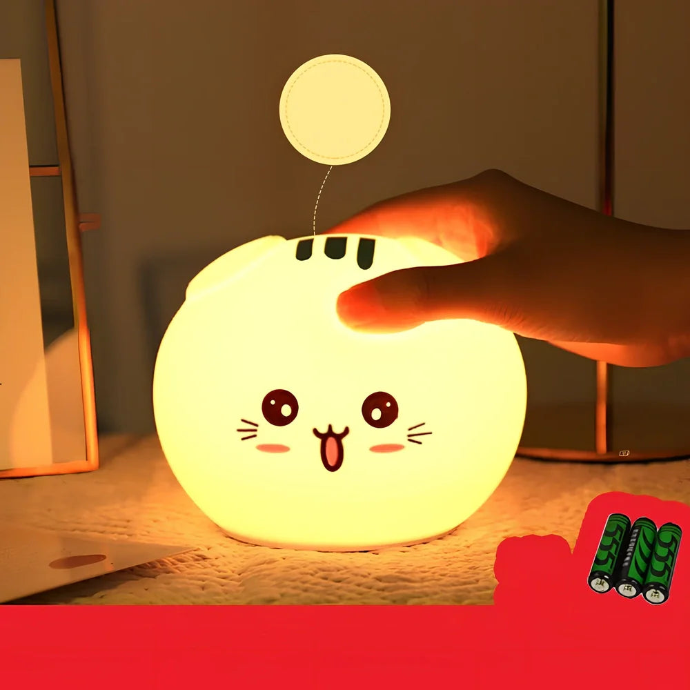 Silicone night light with fold-eared cat design showing LED illumination and USB charging port