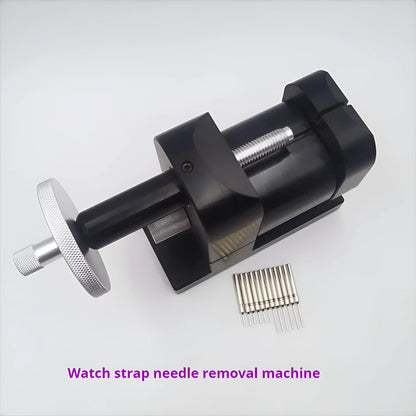 Alloy steel watch strap removal tool for watch repair on a workbench.