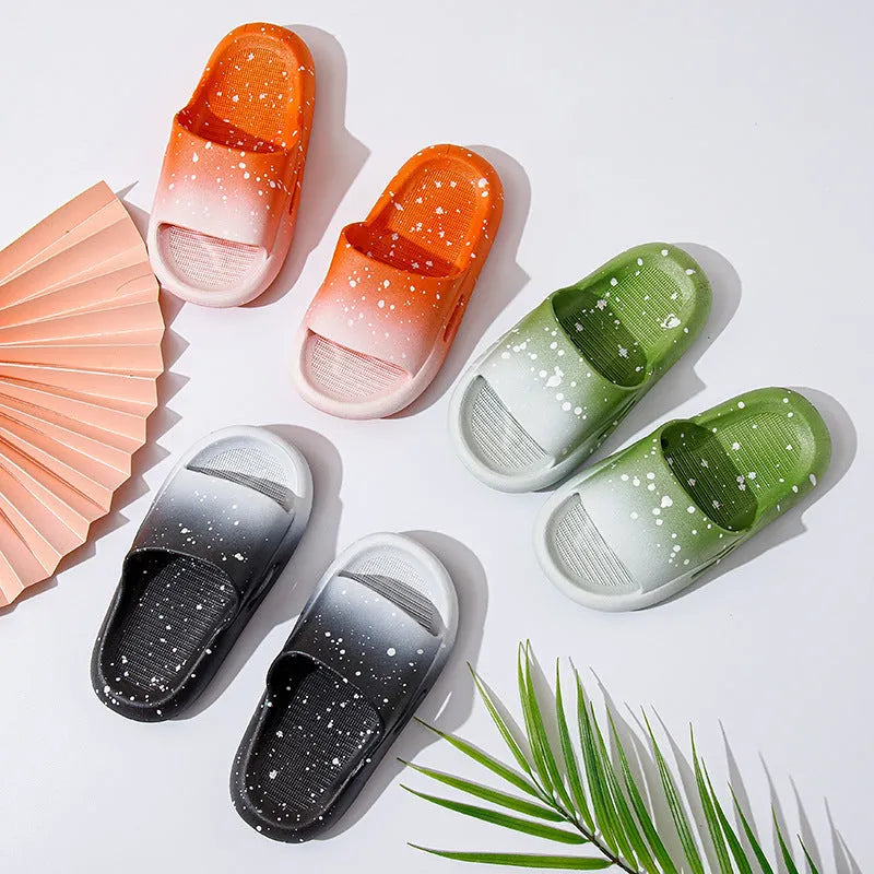 Gradient blue PVC slipper for children on a white background, showing non-slip sole.