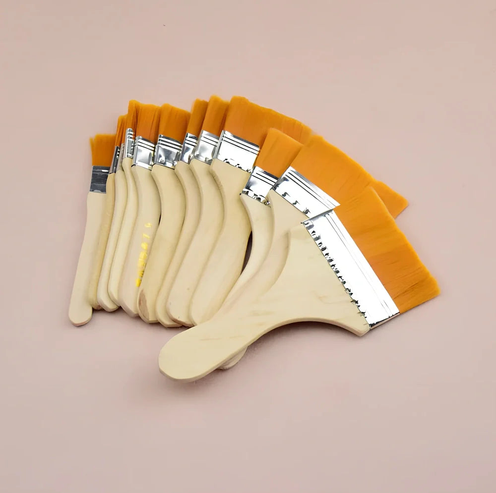 Nylon bristle paint brush with wooden handle measuring 14-18cm length in raw wood colour