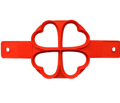 Red silicone egg mould measuring 3x3x6 inches for creating shaped hard-boiled eggs without shells