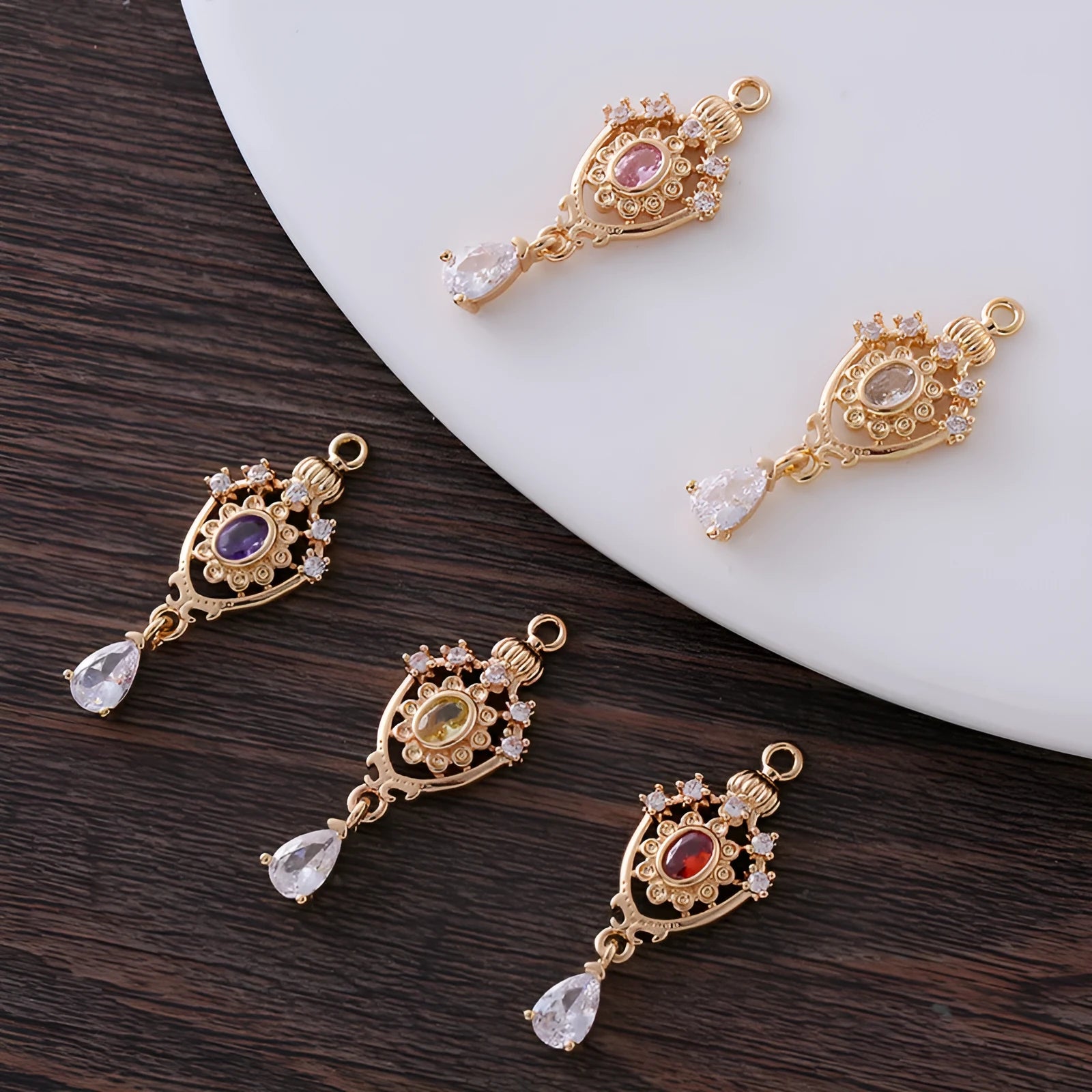 Small copper water drop pendant with zircon detailing in five colour options.