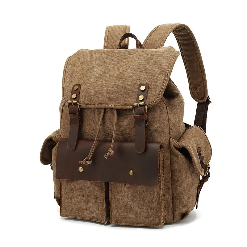 Retro canvas backpack in army green with antique bronze hardware, showing front compartments and size.