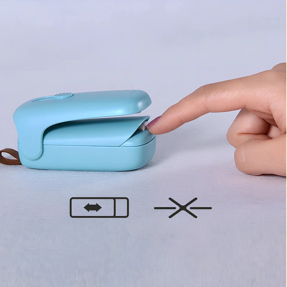 Mini hand pressure heat sealing machine measuring 10cm with magnetic base for plastic bag food preservation