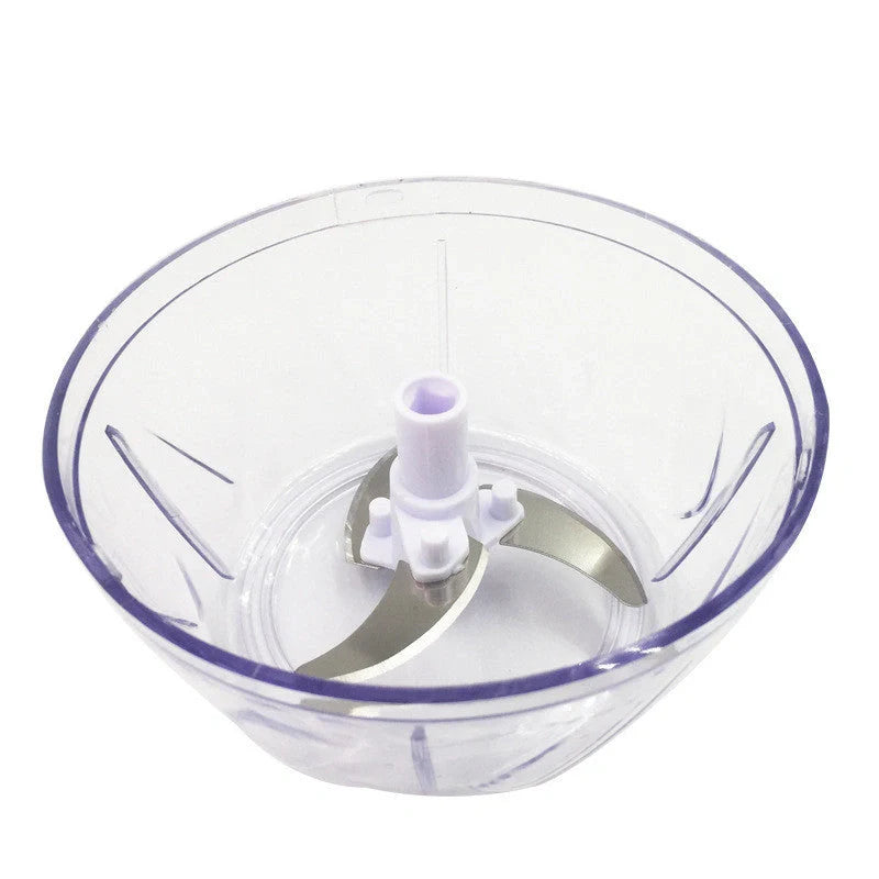 Manual vegetable fruit shredder with stainless steel blade on kitchen counter