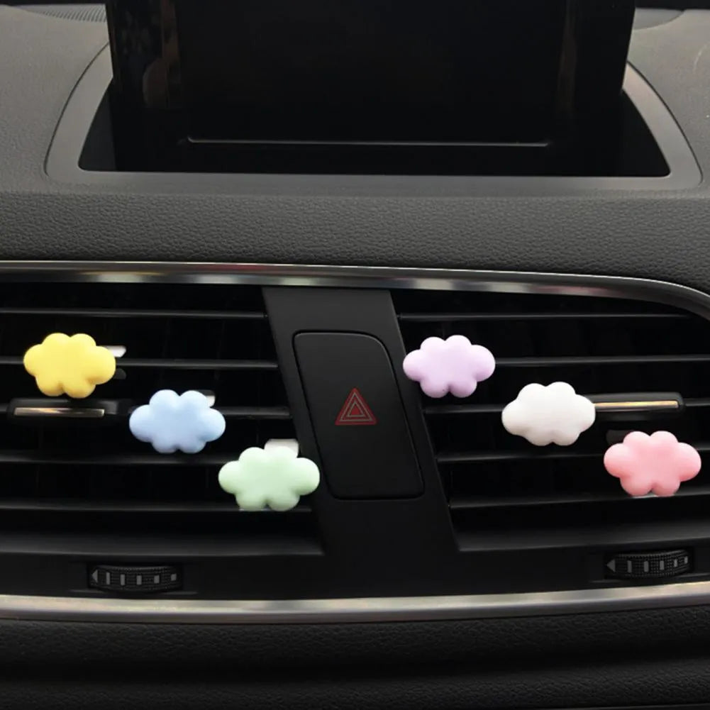 Resin car fragrance clip in light green colour showing 17mm x 27mm dimensions on car air vent