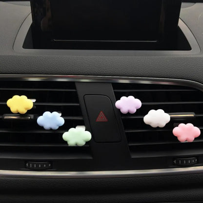 Resin car fragrance clip in light green colour showing 17mm x 27mm dimensions on car air vent