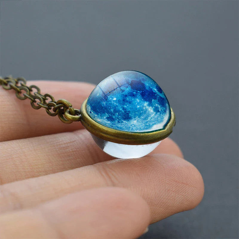 Mesmerizing double-sided galaxy pendant necklace in various celestial patterns and colors
