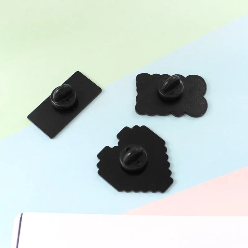 Stereo game console badge made from alloy metal with three colour variations CC1122, CC1123, CC1124, a standalone accessory for mounting on bags with independent OPP packaging