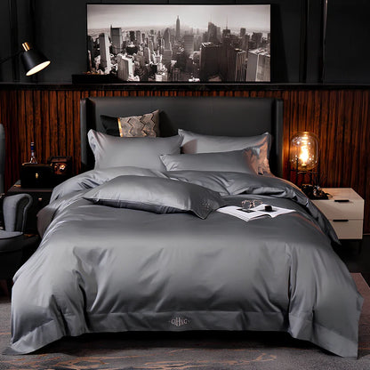 Four-piece quilted cotton bed set in royal blue, showing 200x230 cm cover and 48x74 cm pillowcases for 1.5m bed