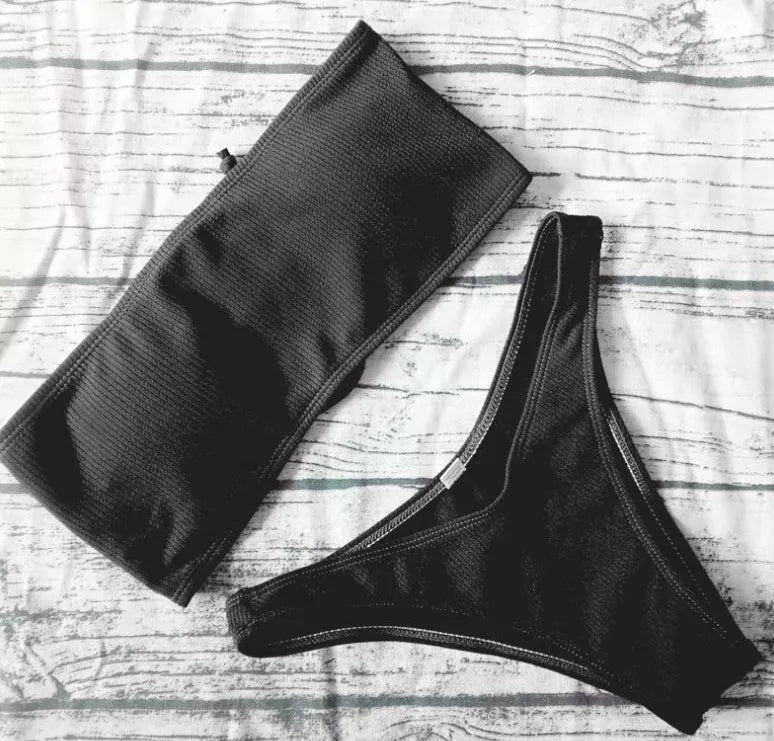 Ladies' bikini swimwear in solid colors with chest pad for support