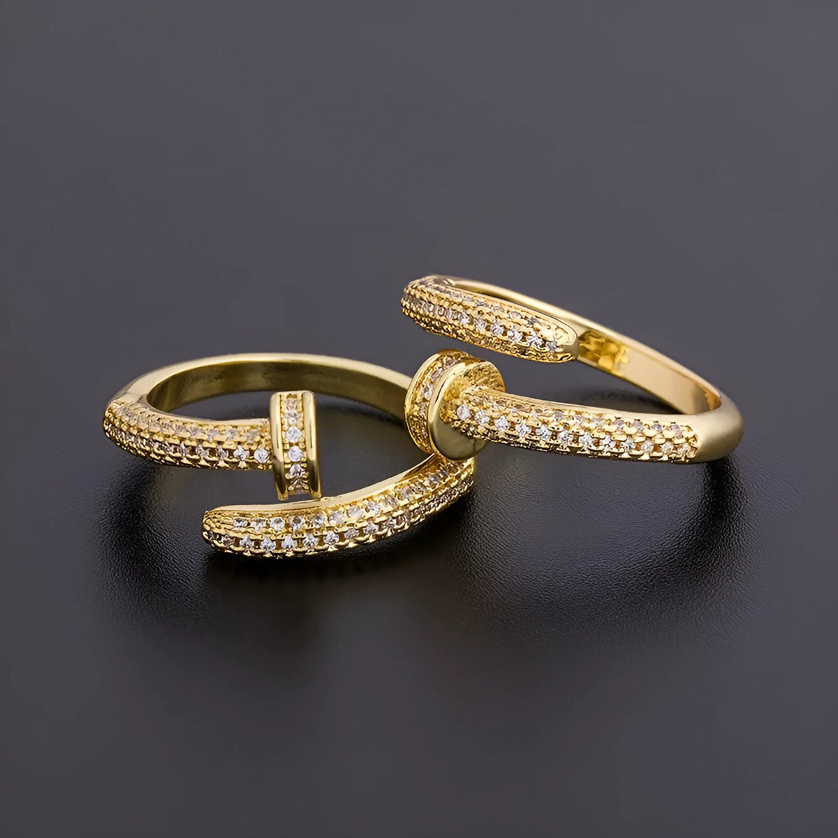Personalized nail ring in gold with geometric metal design and inlaid drill detail, adjustable opening