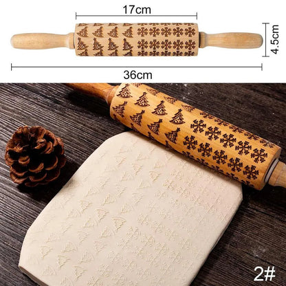 Wooden rolling pin with engraved Christmas patterns including reindeer and snowflakes on a 45cm long barrel.