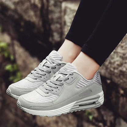 Women's casual shoes with a low heel in beige orange, grey, and pink purple colour options.