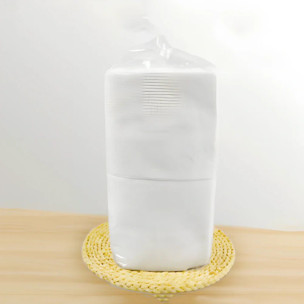 Pack of non-woven disposable bath towels 65x135cm with pearl pattern for absorbent drying