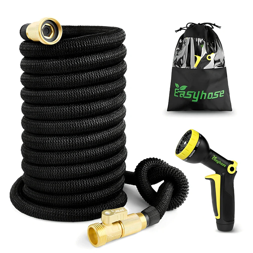 Expandable flexible water hose with spray gun showing green colour and extended length with water spraying in cone pattern