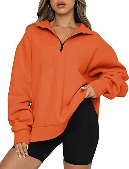 Women's zip turndown collar sweatshirt in various colors, showcasing loose fit and zipper detail.