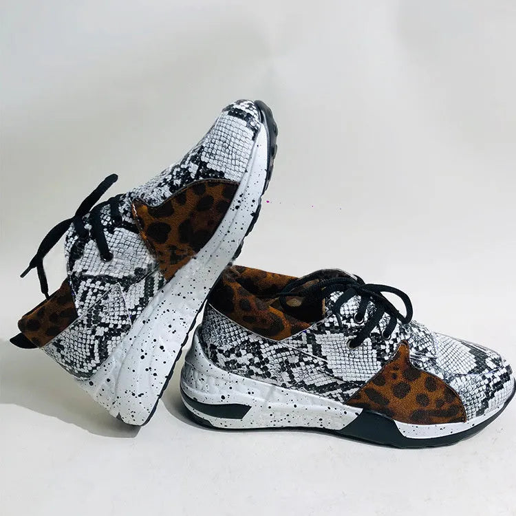 Women's casual sports shoes in black suede with wedge heel and round toe for daily wear