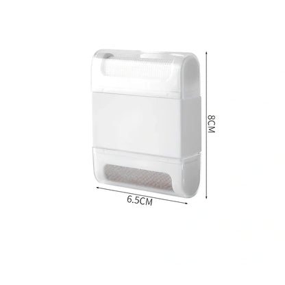 Portable manual fabric cleaning brush with removable catching net, 6.4 cm wide plastic construction