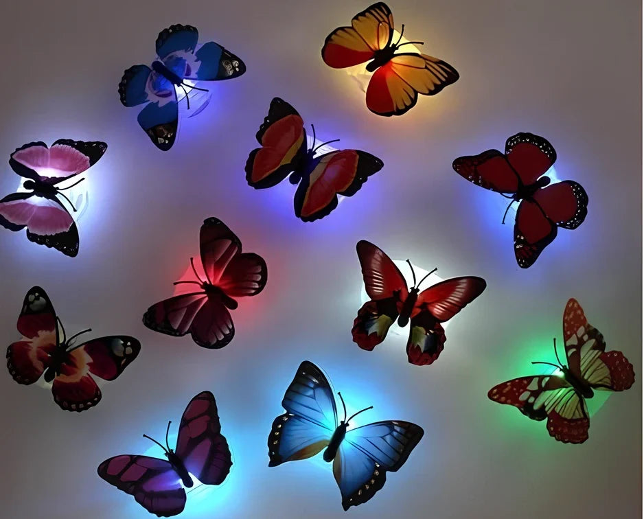 Set of 12 butterfly LED night lights with auto-changing colours and suction pads for wall mounting
