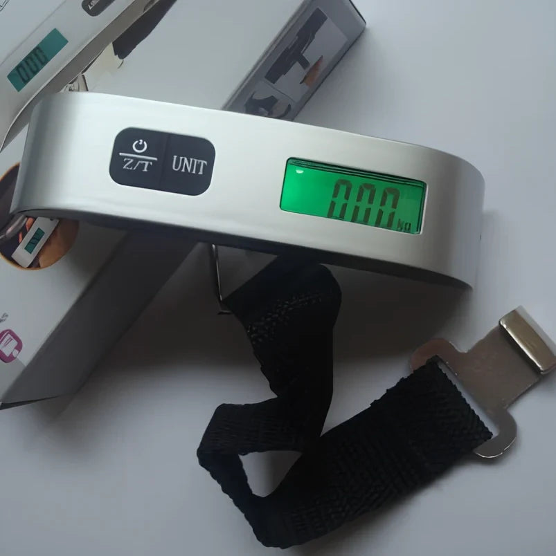 Black T-shaped electronic scales with backlit LCD display showing weight measurement