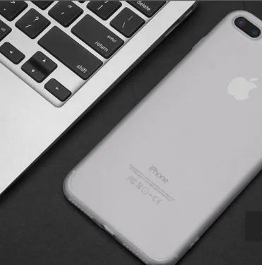 A flexible TPU silicone case for an iPhone, shown in a choice of black, blue, red, or white.