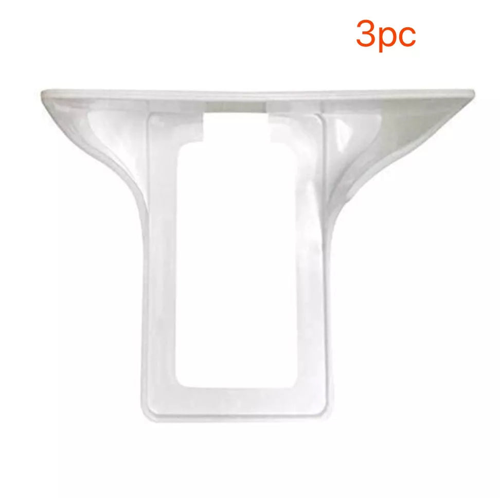 White wall outlet organizer with rubber pad for easy cable management