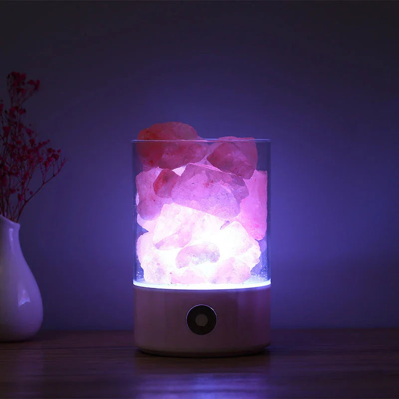 Himalayan salt lamp with warm, soothing glow and color-changing capabilities for air purification and relaxation