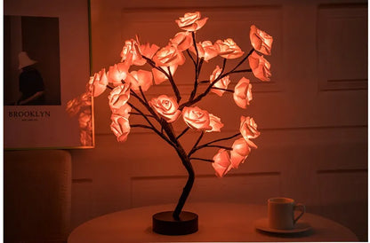 White and red rose flower LED lamp on a bonsai tree stand with warm white lights.