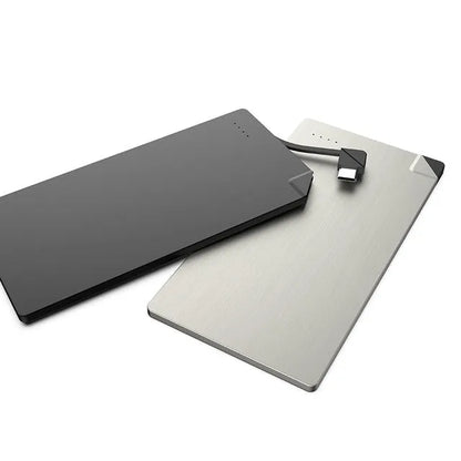 Silver graphene battery power bank showing slim 4mm profile with charging port