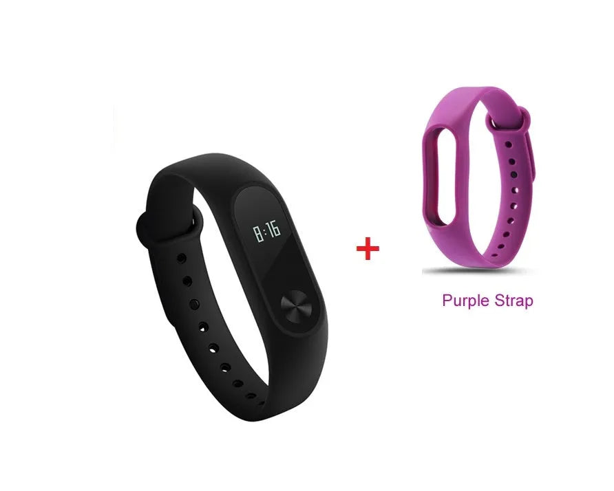 Xiaomi Mi Band 2 black fitness tracker with OLED display showing heart rate and time on adjustable wrist strap