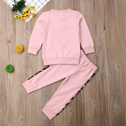 Pink cotton print sweatshirt and matching pants two-piece set with Asian sizing chart showing measurements