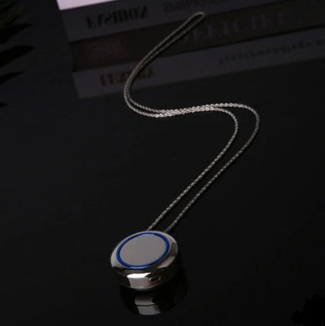 Portable negative ion air purifier necklace in blue, white, and silver