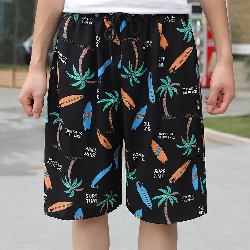 Man wearing loose-fitting striped beach pants made from quick-dry ice silk fabric.