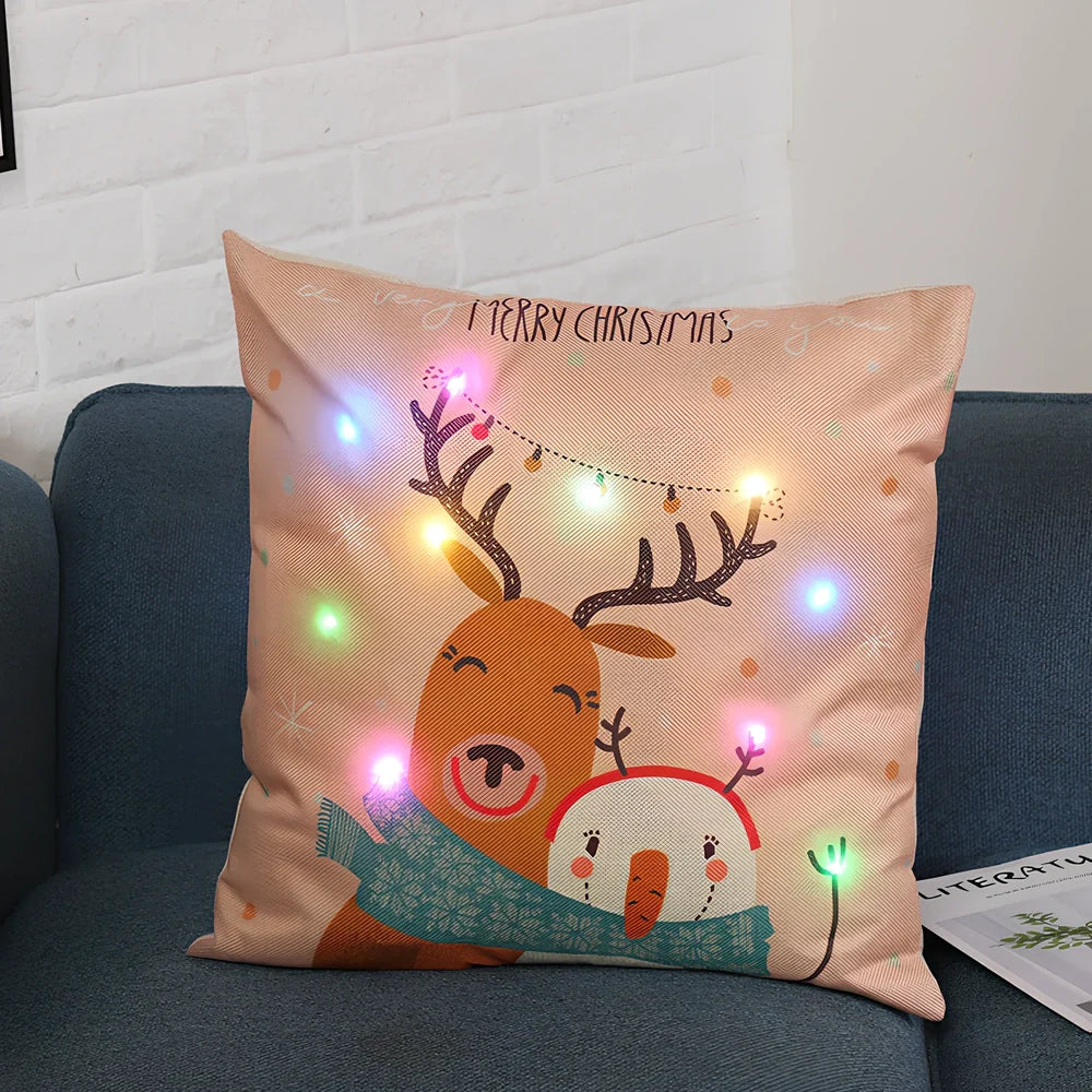 45cm square Christmas cushion with linen cover and battery-operated lighting showing festive design