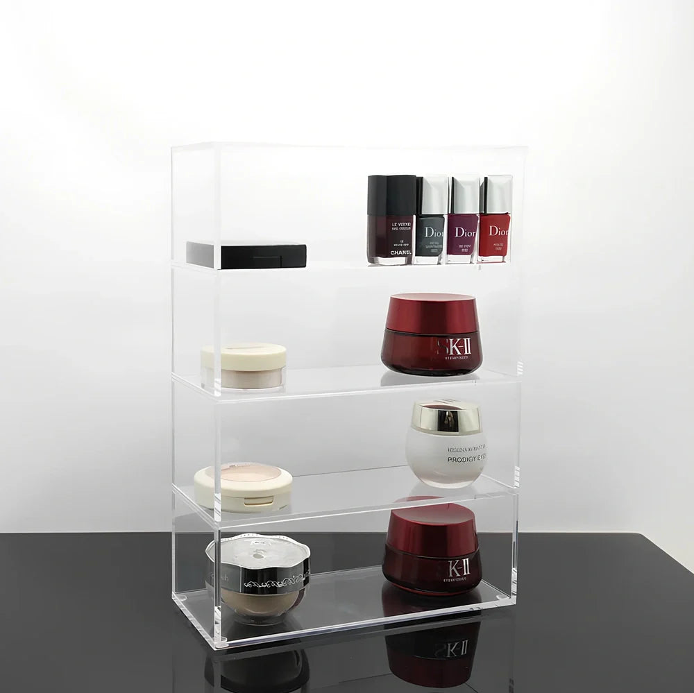 Clear acrylic cosmetic storage box measuring 24x10x34cm with transparent sides showing makeup organisation
