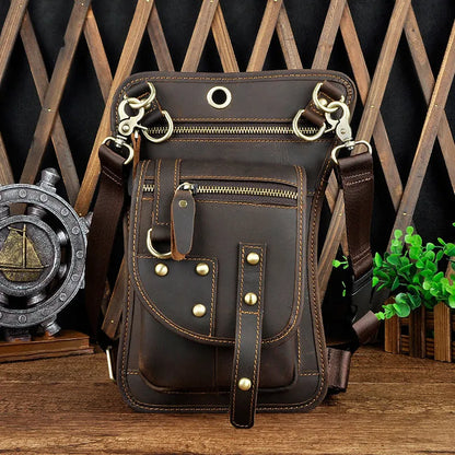 Men's black punk fanny pack with cowhide leather, zipper closure, and internal phone and ID compartments.