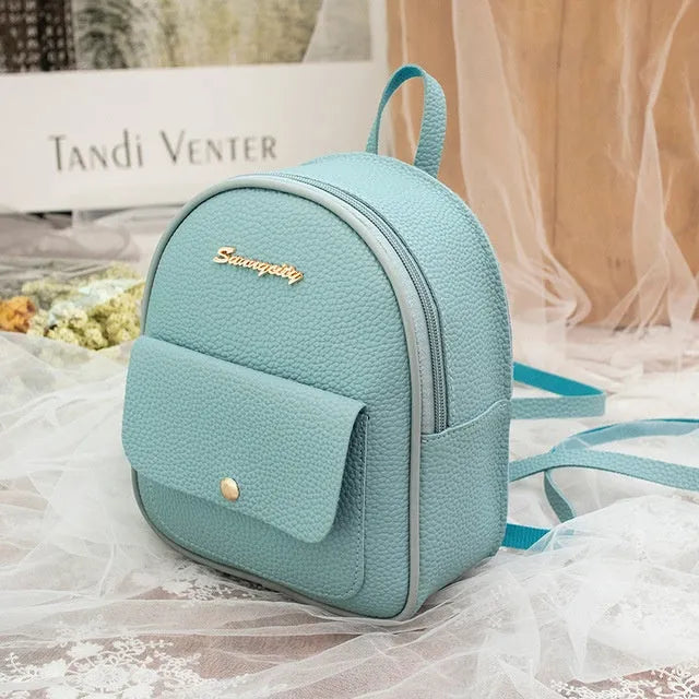 Small women's shoulder backpack in solid colour with zipper closure, dimensions 18.5cm x 8cm x 21cm