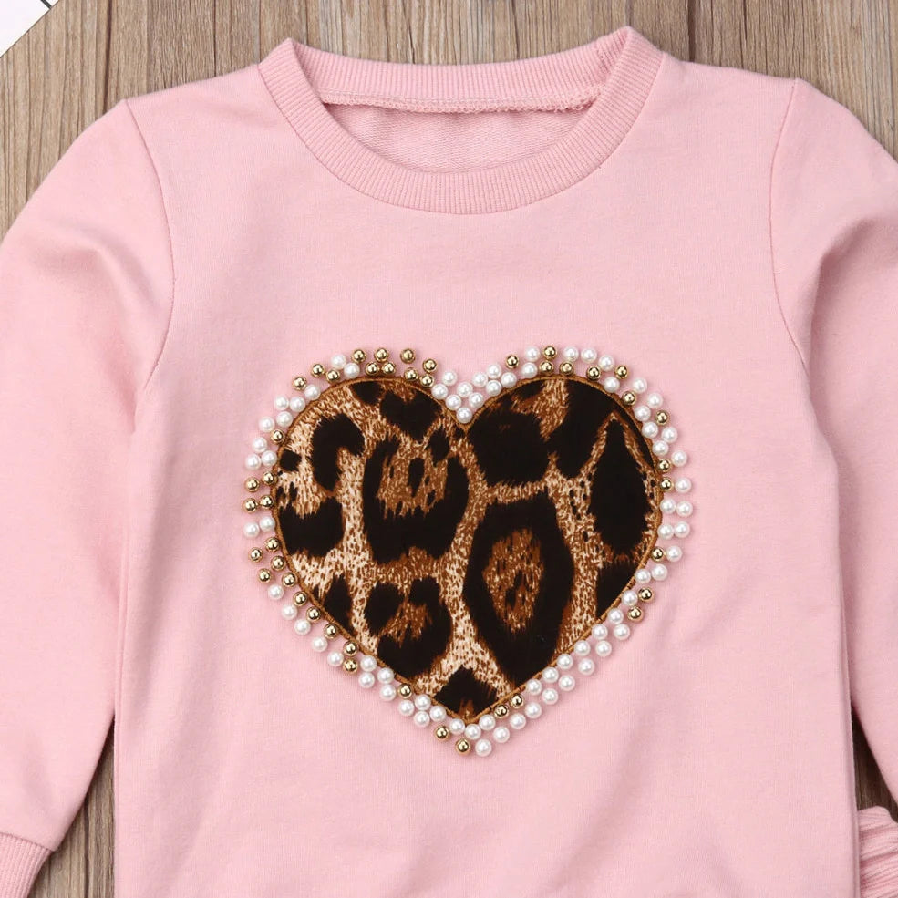 Pink cotton print sweatshirt and matching pants two-piece set with Asian sizing chart showing measurements