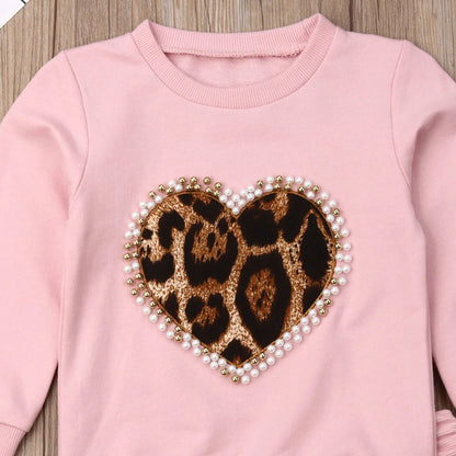 Pink cotton print sweatshirt and matching pants two-piece set with Asian sizing chart showing measurements