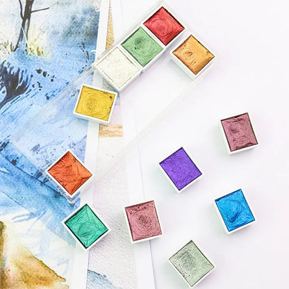 Boxed set of solid watercolour pigment blocks with pearlescent metallic finish in multiple colours