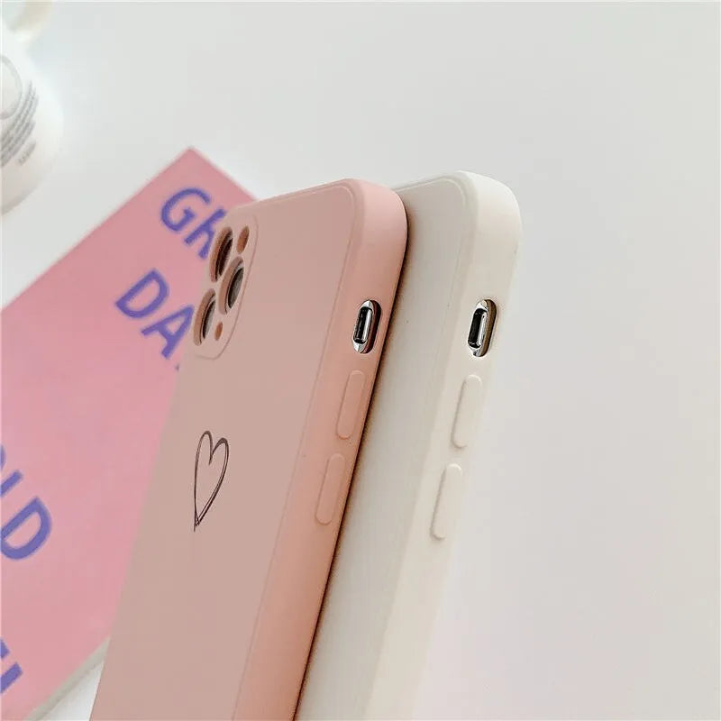 Silicone iPhone case in solid colours like black, green, pink, and white, showing TPU material and slim back cover design
