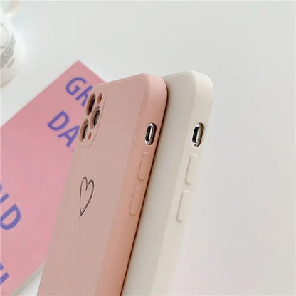 Silicone iPhone case in solid colours like black, green, pink, and white, showing TPU material and slim back cover design