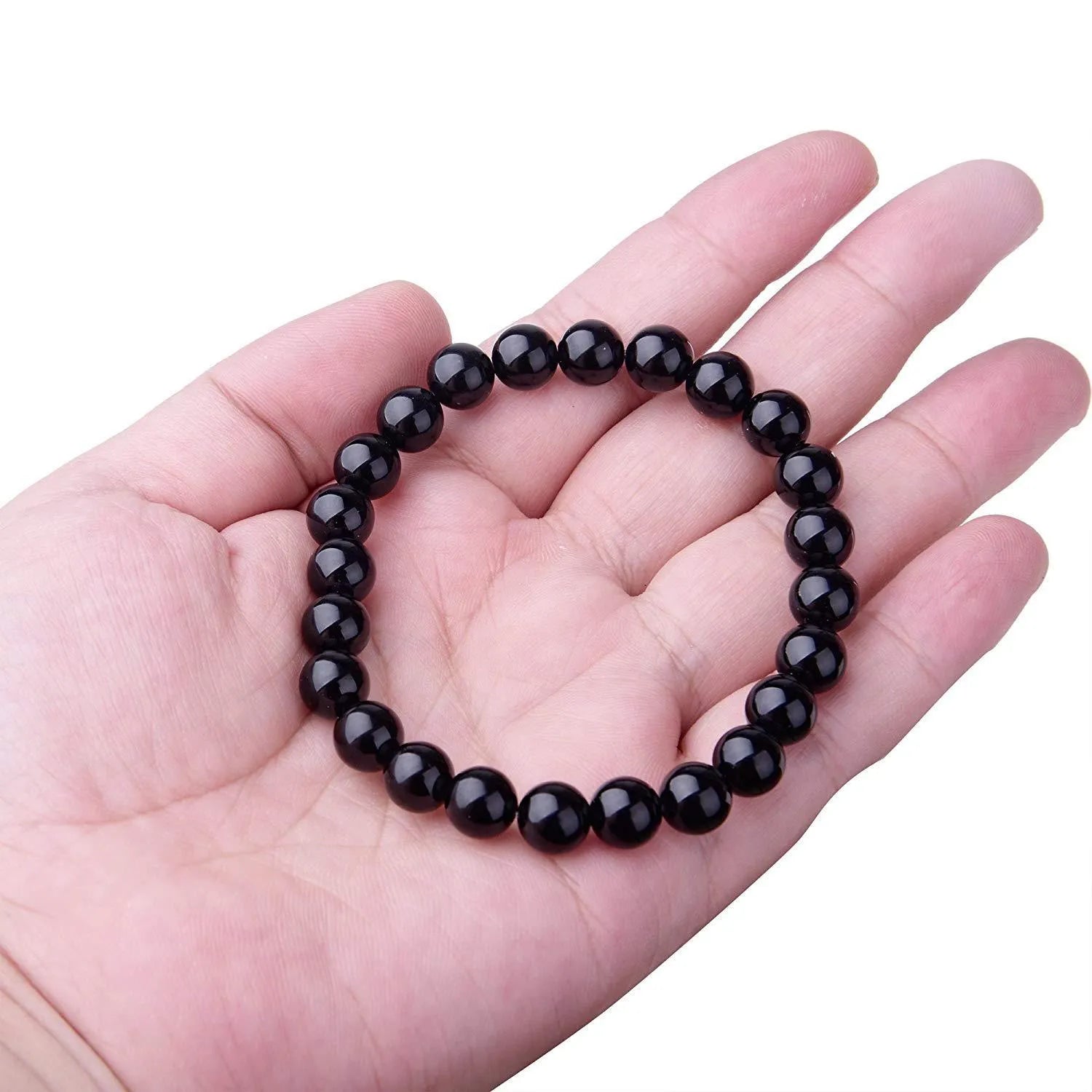 Geometric black agate bracelet for women with 8mm beads on a black elastic cord.