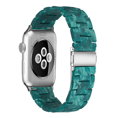 Slim resin Apple Watch strap showing attachment mechanism and colour options