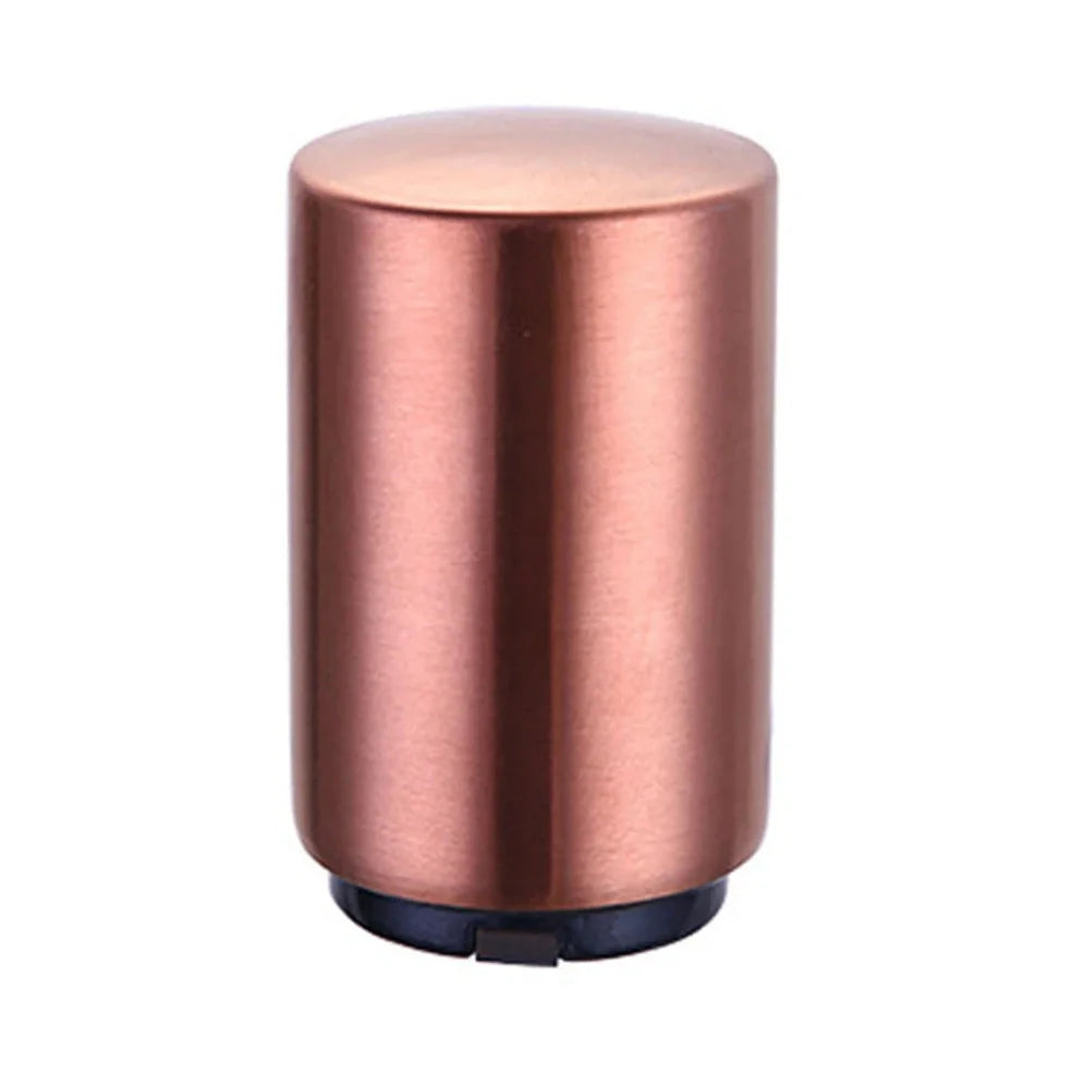 Stainless steel automatic press bottle opener with titanium-plated finish showing press mechanism and textured handle