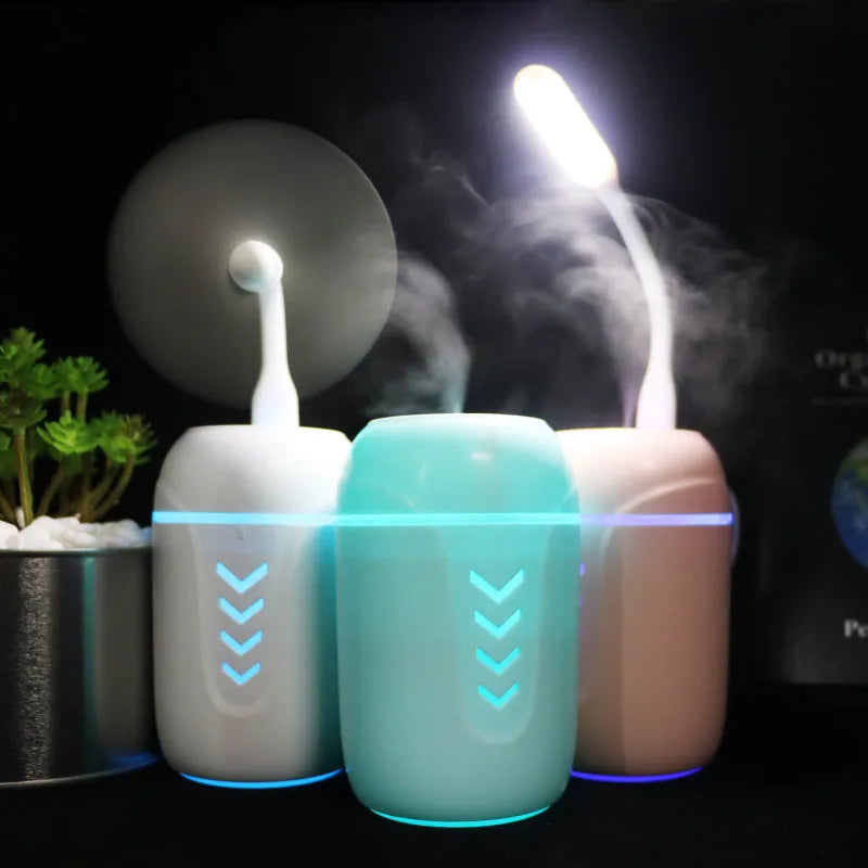 X3 model portable columnar humidifier in blue, with USB cable.