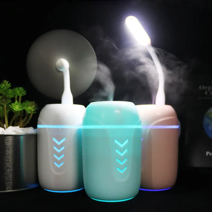 X3 model portable columnar humidifier in blue, with USB cable.