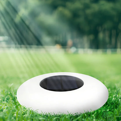 White solar lawn light with UFO design for garden illumination, 300mm diameter with remote control