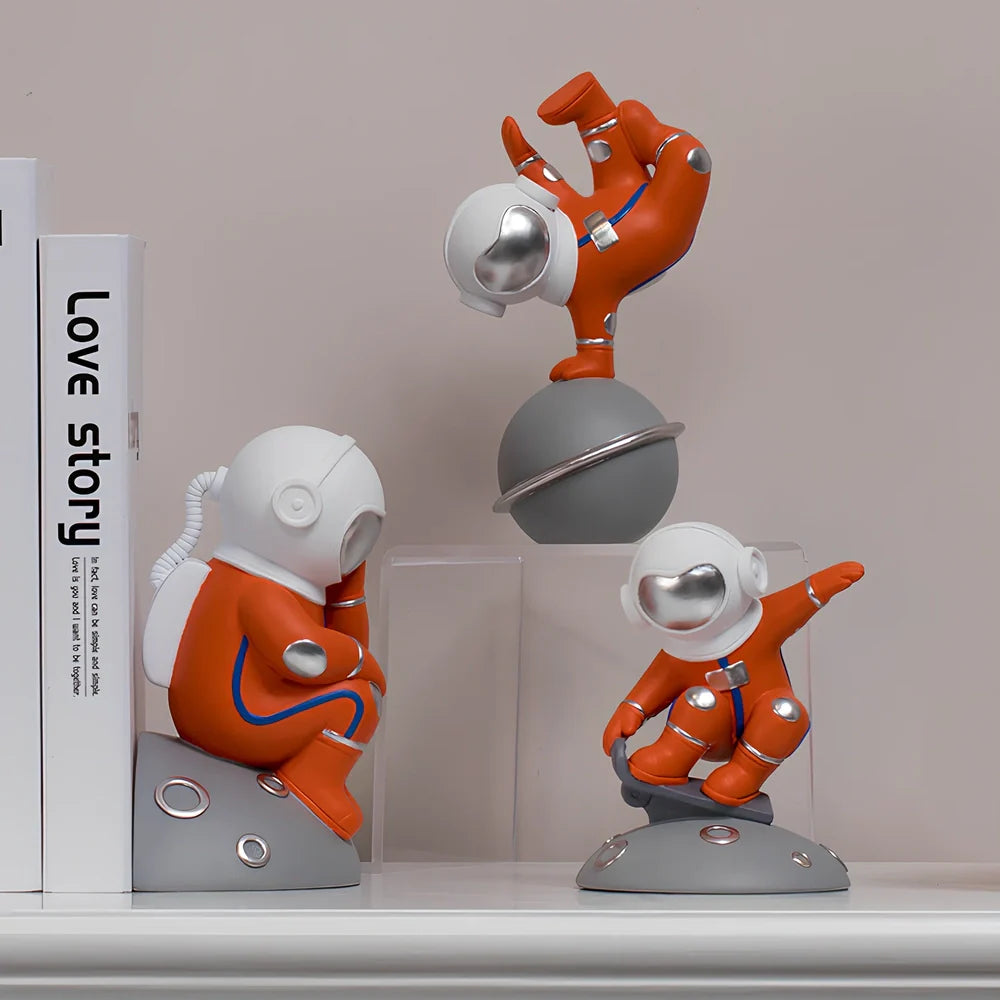 Hand-carved resin astronaut decoration in red or white with handstand, meditate, or skateboard poses